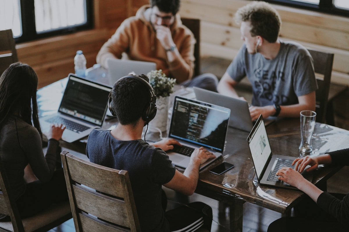 Collaborative diverse engineering team in modern India office